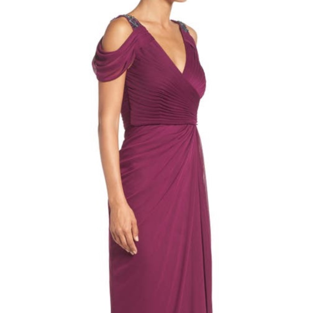 Rouched gown with beaded shoulder.